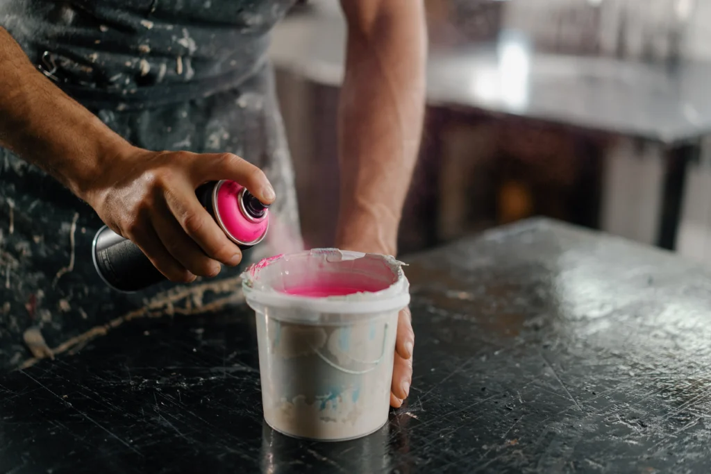 A man making paint for kitchen countertop