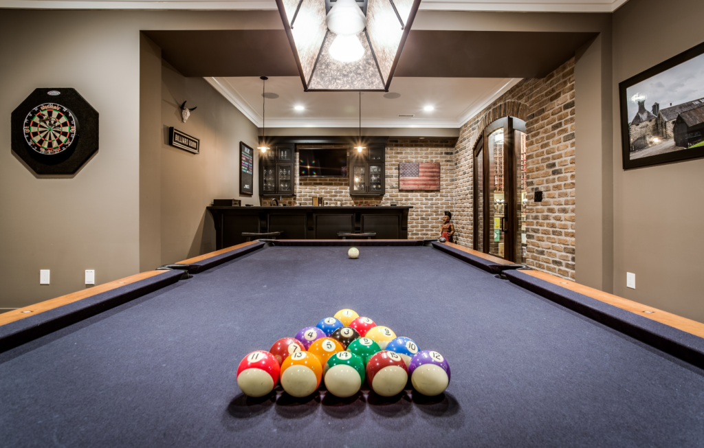 Personal Style in Entertainment Room with Pool Table, Dart Board, Custom Lighting, and Americana themes in Custom-Built Luxury Home | Tulacro Development | Luxury Custom Home Builders | Bethesda, MD | Montgomery County